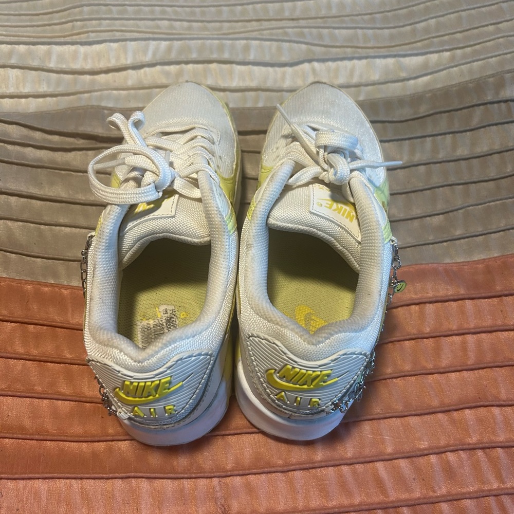 Women Nike Athletic Shoes.  Color Yellow/White. Size 8.5.  Slightly Worn.